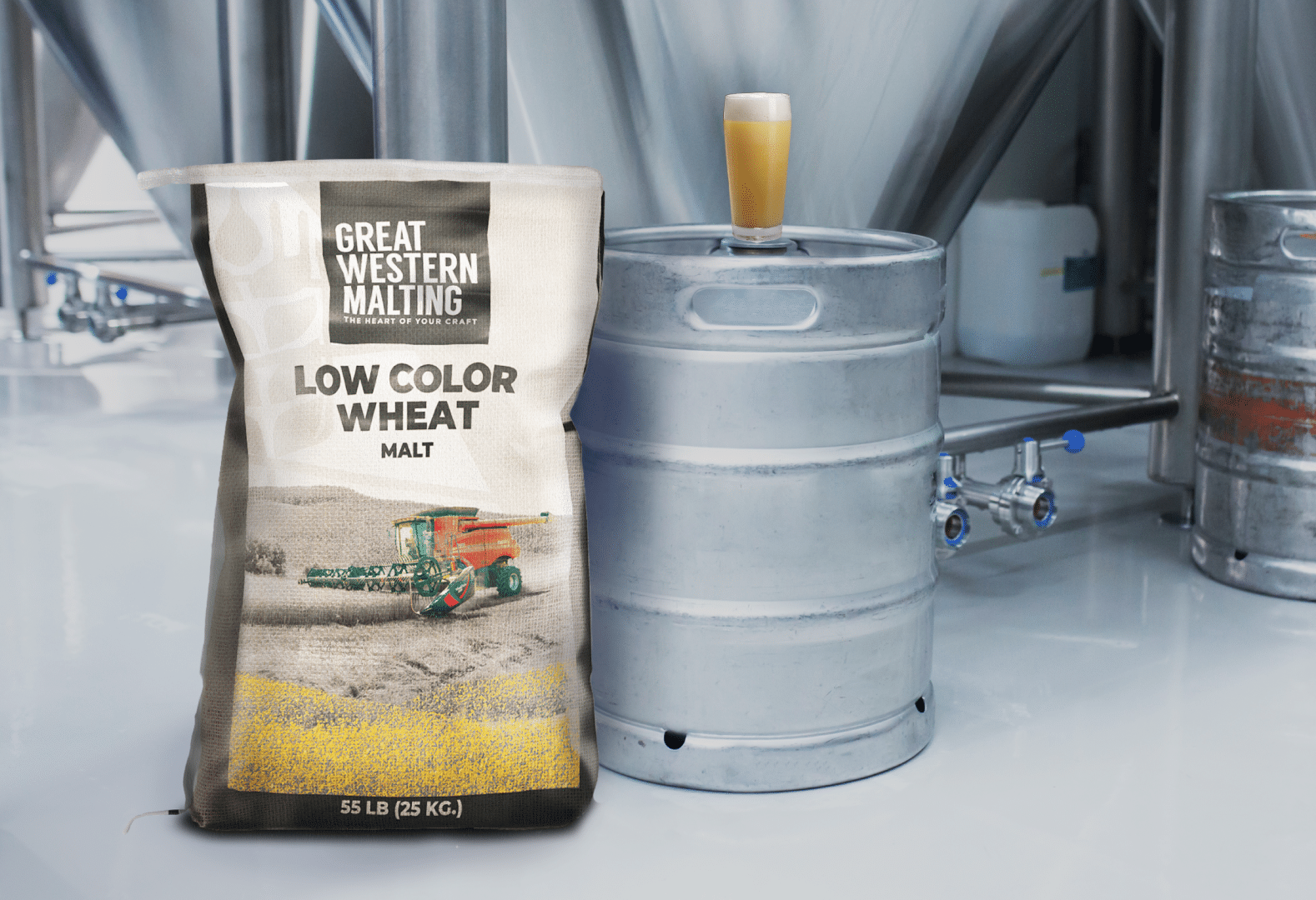 A bag of Low Color Wheat Malt from Great Western Malting, one of Soufflet Malt's heritage brands, displayed alongside brewery equipment.